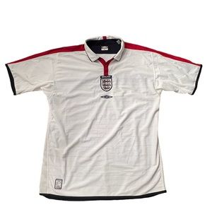 Umbro reversible, polo. Men’s size L. NWT